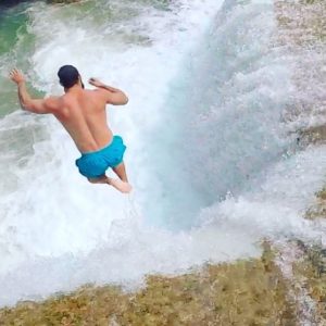Myanmar adventure travel - waterfall jump